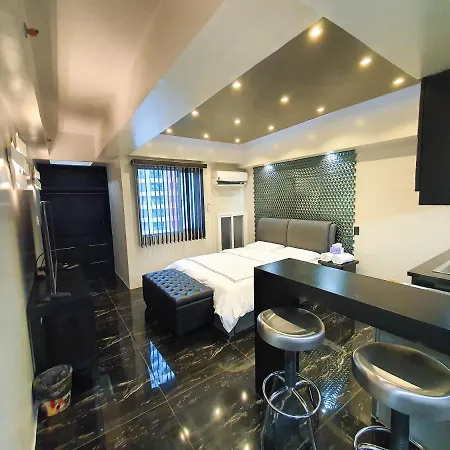 Burgundy Mckinley Place Service Apartment Manila Exterior photo